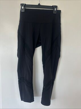Lululemon black capris leggings with mesh details
